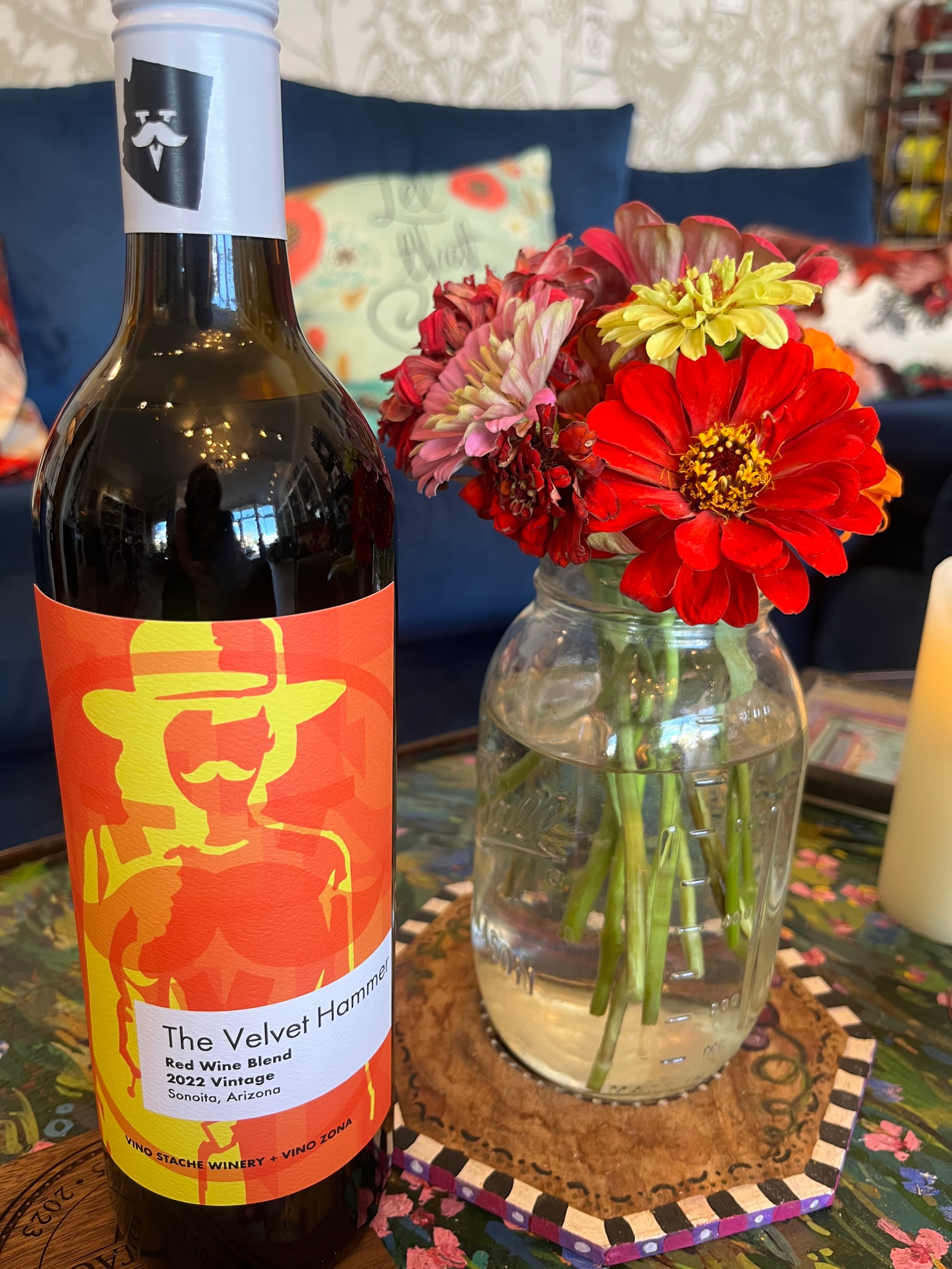 Velvet Hammer wine bottle with fresh flowers
