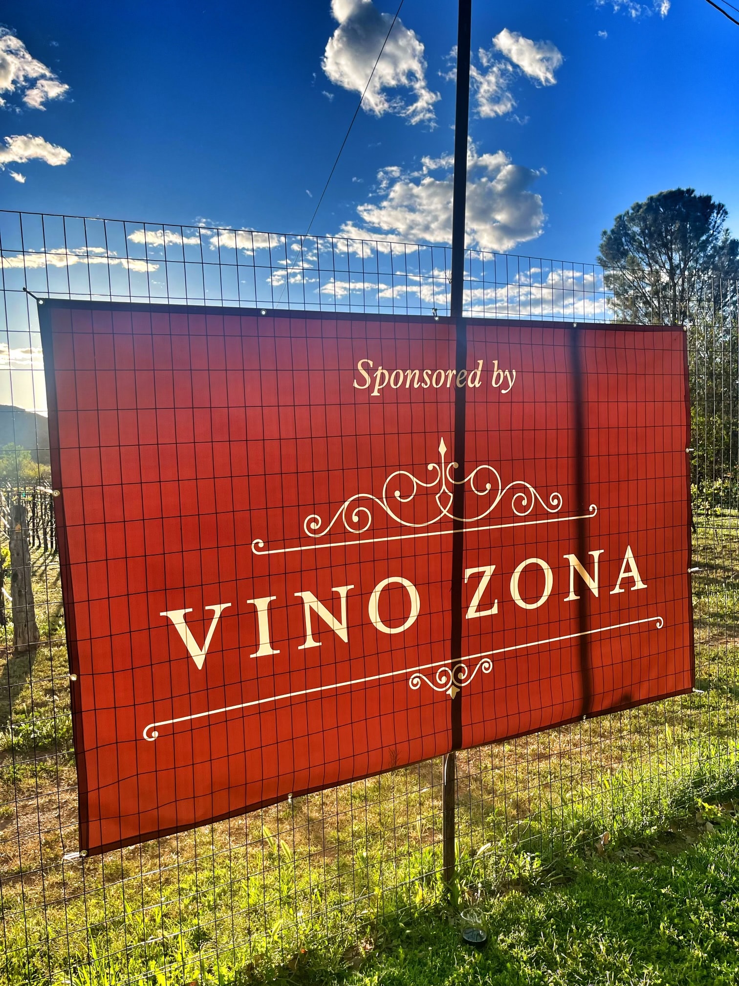 Vino Zona sponsored banner at Arizona vineyard