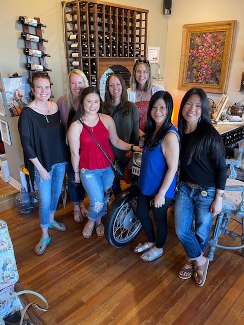 Group of women posing at Vino Zona Jerome