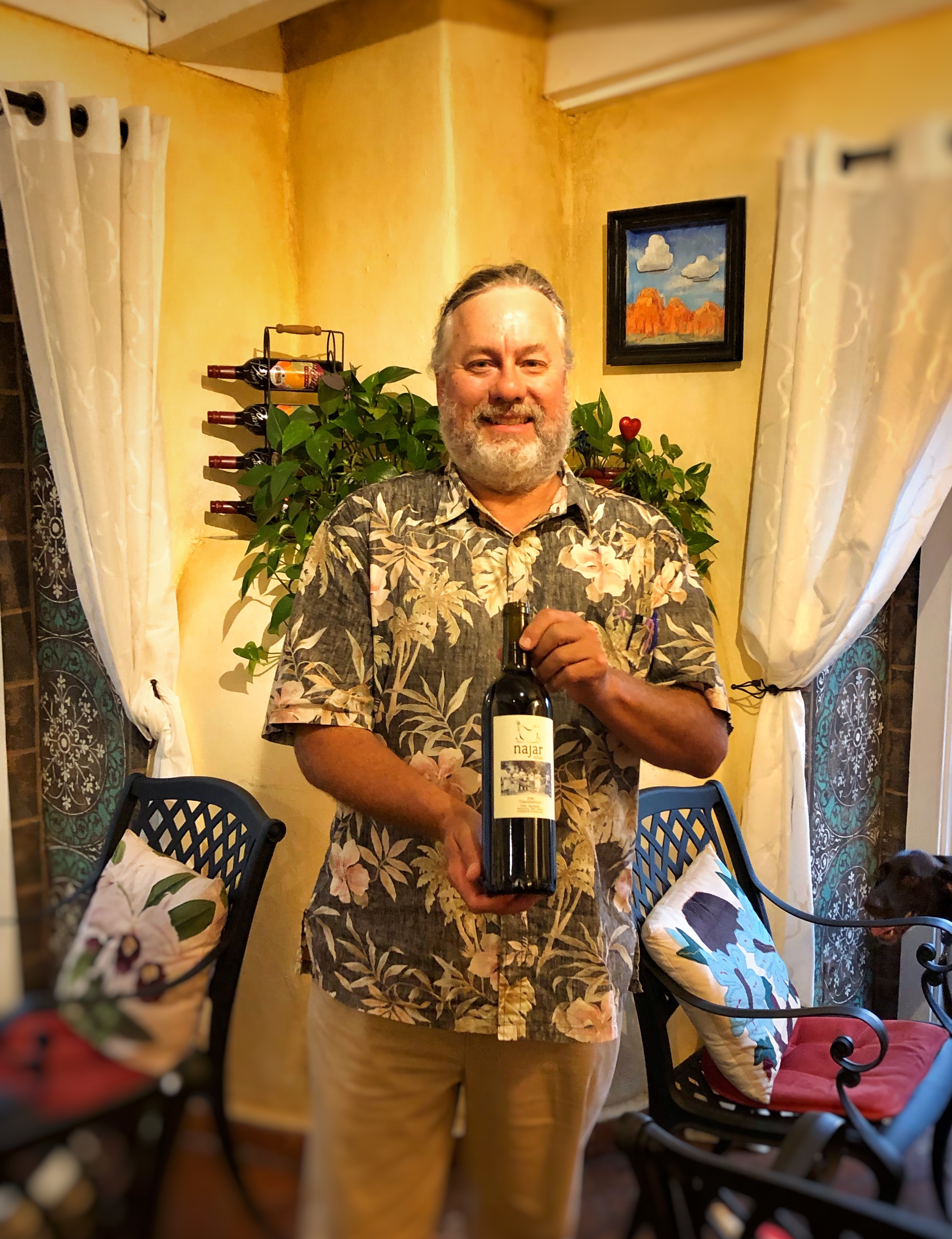 Man holding Najar wine bottle at Vino Zona Sedona