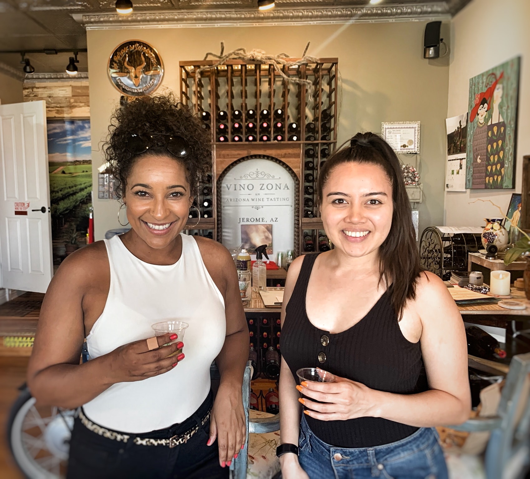Two women smiling at Vino Zona Jerome tasting room